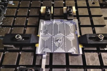 Figure 3 Combination fixture clamping for milling internal cavities Figure 3 Combination fixture clamping for milling internal cavities