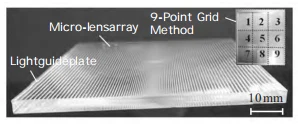 Figure 1 Precision ground microgrooves on a lens array light guide plate Figure 1 Precision ground microgrooves on a lens array light guide plate